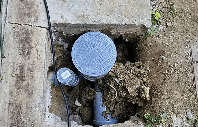 日野町村井の沈下した汚水桝交換と排水不良修理施工事例写真