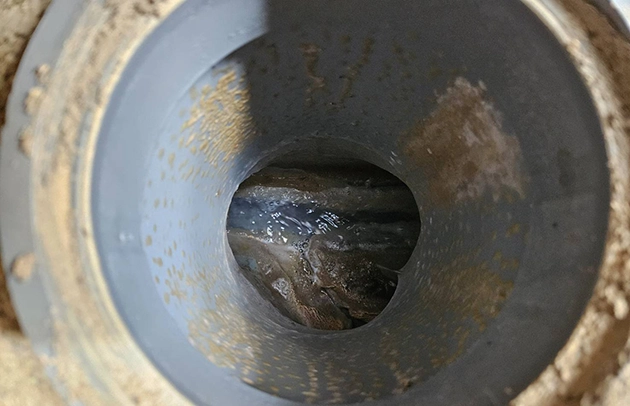 大津市石山の屋外排水の逆流で行う排水管高圧洗浄施工事例写真