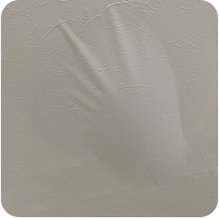 漏水で膨らんだ天井クロス