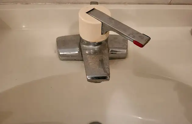 東近江市能登川の洗面止水栓ハンドル部の水漏れ施工事例写真