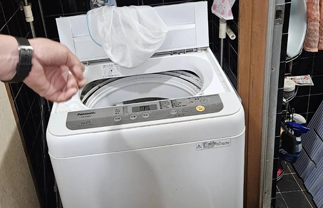 甲賀市甲南町の洗濯機給水ホース接続の水漏れ施工事例写真