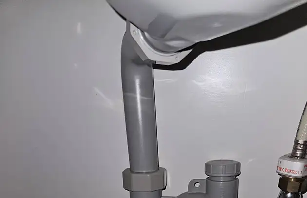 守山市播磨田町の洗面配管接続部の水漏れ施工事例写真