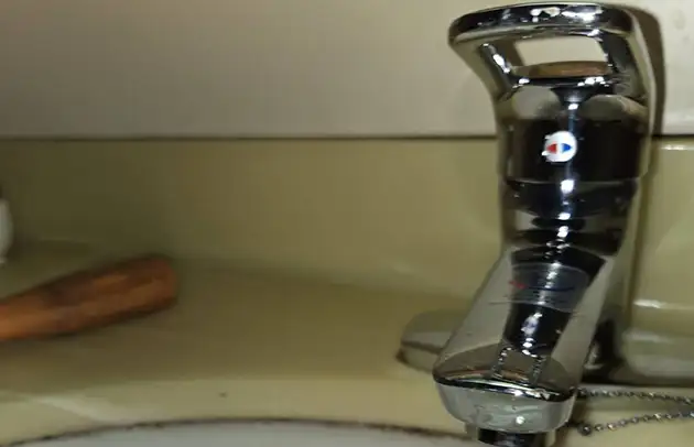 多賀町富之尾の洗面水栓スパウト根元の水漏れ施工事例写真